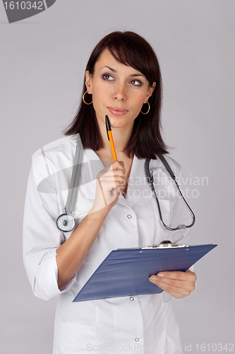 Image of Female Doctor in Thoughtful Pose