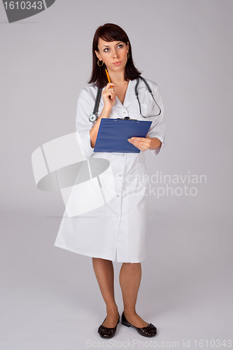 Image of Female Doctor in Thoughtful Pose