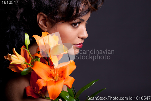 Image of Pretty Woman with Lily Flowers