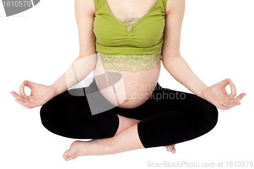 Image of Pregnant woman Practicing Yoga