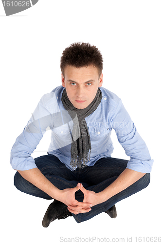 Image of Casual Young Man Sitting