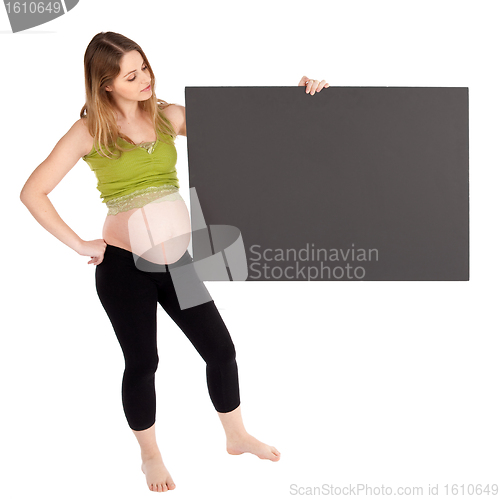 Image of Pregnant Woman Holding Blank Board