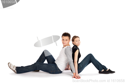 Image of Couple Sitting Back to Back