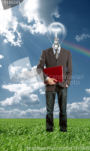 Image of Full length portrait of businessman with laptop outdoor