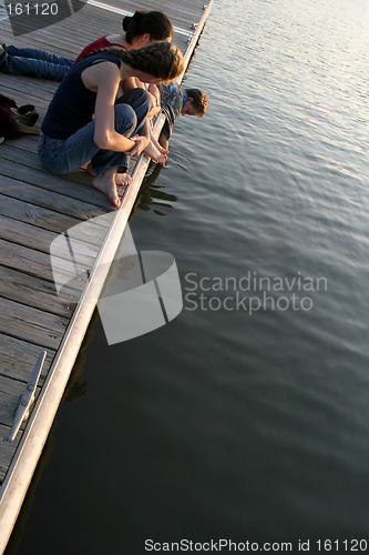 Image of Teens on a Pier