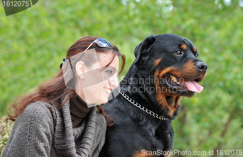 Image of young woman and her dog