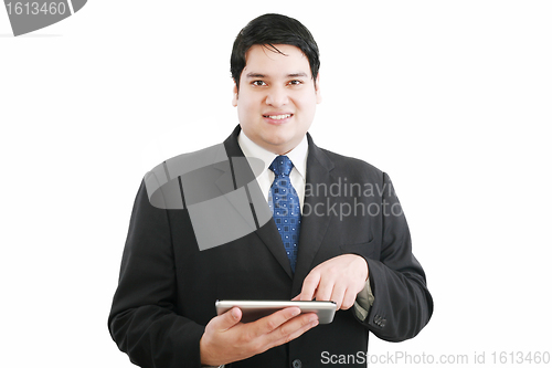 Image of business man with modern tablet pc, touch pad, smart phone