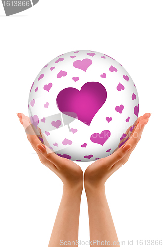 Image of Hands holding a Love Sphere