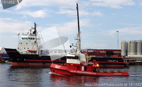 Image of Tugboat and supply boat.