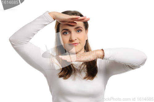 Image of Young woman stands