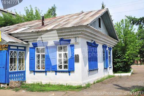 Image of Russian rural house with carved windows