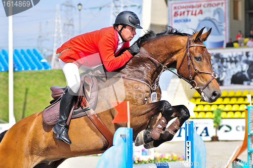 Image of Rider on jump horse