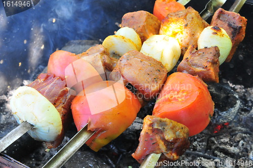 Image of Barbecue with delicious grilled meat