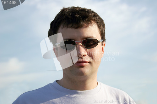 Image of Young man against the sky