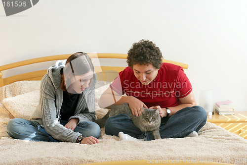 Image of Couple with a kitten