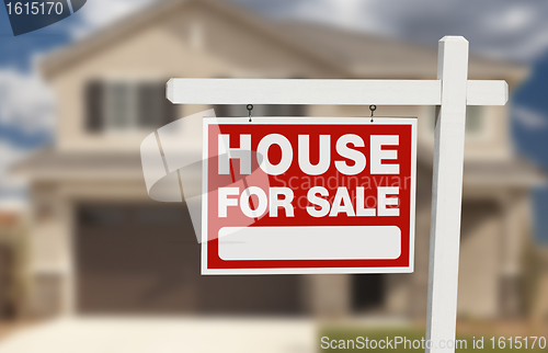 Image of House For Sale Real Estate Sign and New Home