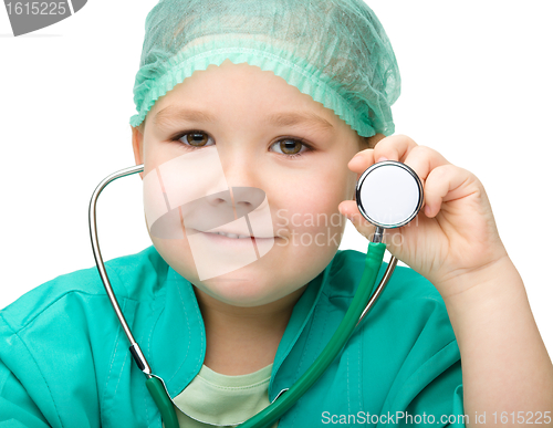 Image of Little girl is playing doctor with stethoscope