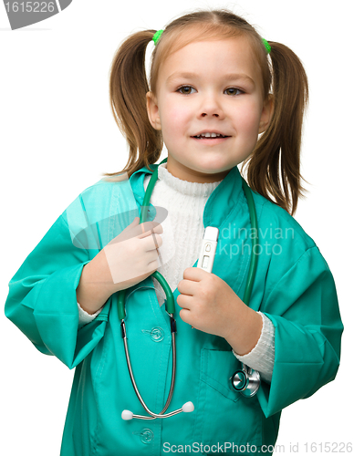 Image of Cute little girl is playing doctor