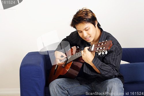 Image of Guitar player