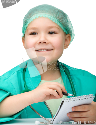 Image of Cute little girl is playing doctor