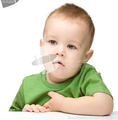 Image of Portrait of a cute and pensive little boy