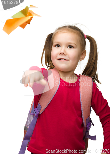 Image of Portrait of a cute schoolgirl with backpack