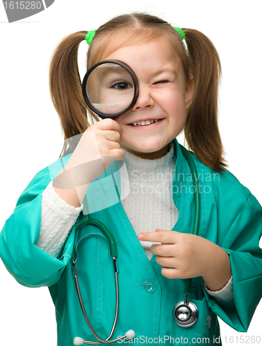 Image of Cute little girl is playing doctor