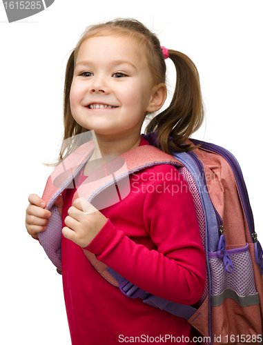 Image of Portrait of a cute schoolgirl with backpack