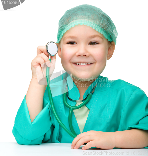 Image of Little girl is playing doctor with stethoscope