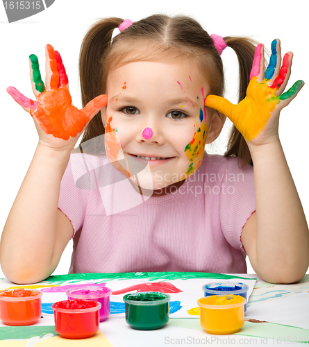 Image of Cute cheerful girl with painted hands