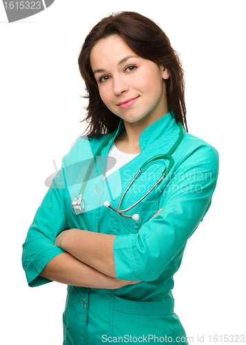Image of Portrait of a happy young attractive woman doctor