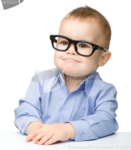 Image of Portrait of a cute little boy wearing glasses
