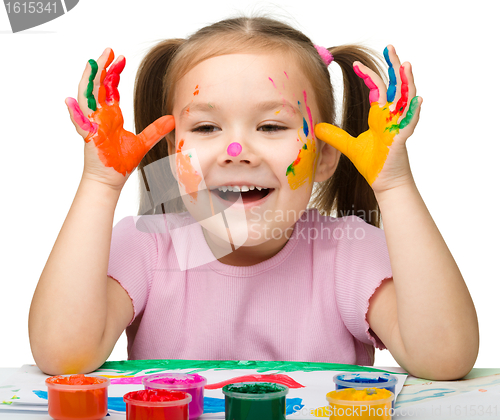 Image of Cheerful girl with painted hands