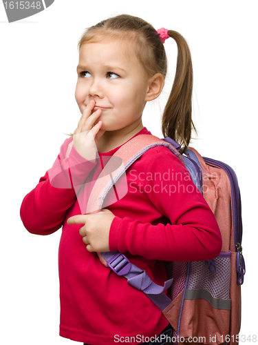 Image of Portrait of a cute schoolgirl with backpack
