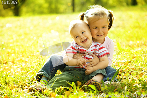 Image of Cute children are playing in park