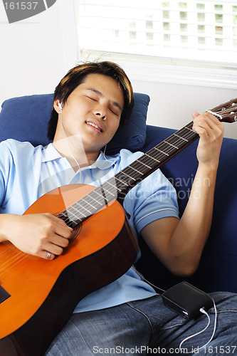 Image of Guitar player