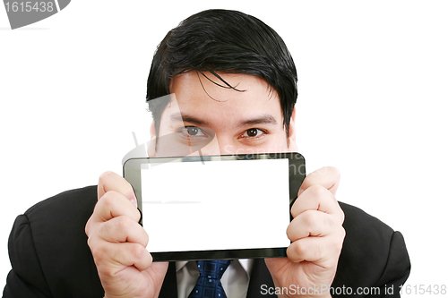Image of Young businessman holding a touch pad tablet pc on isolated whit