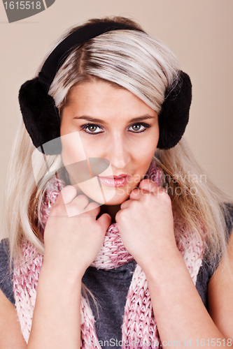 Image of Cheerful woman clothing in warm hat. Winter season.