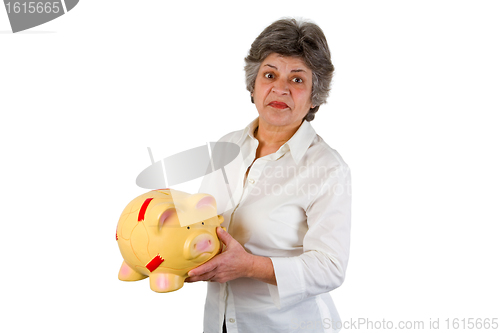 Image of Female senior with piggy bank