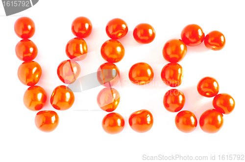 Image of The word "VEG" made of cherry tomatoes