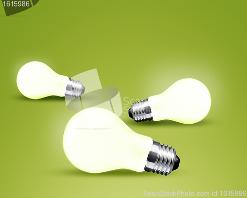Image of Three glowing Light bulb idea on green background