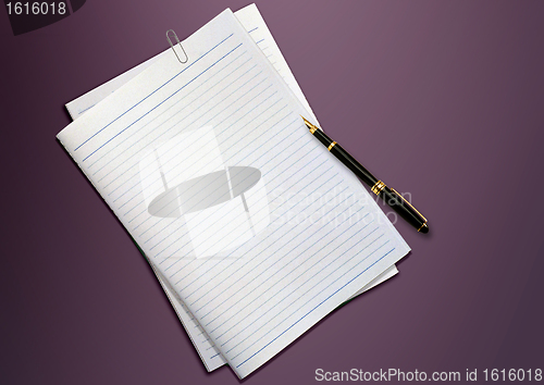 Image of a pen and blank paper on the table 