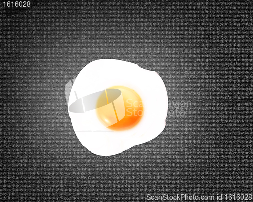 Image of Fried egg on black background
