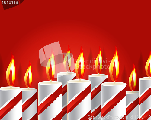 Image of burning candle and shadow on red background 