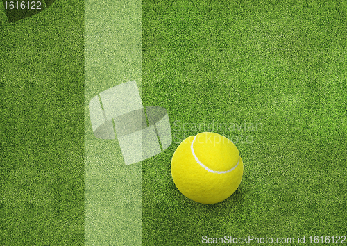 Image of tennis ball beside the court line.