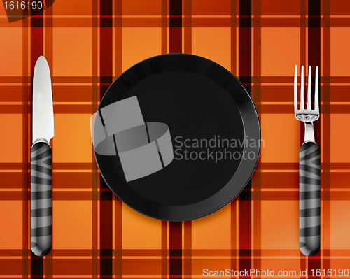 Image of Empty Plate with knife and fork