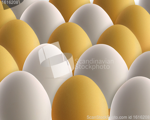 Image of set of golden and white eggs