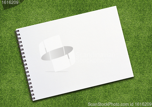 Image of Notebook on grassland