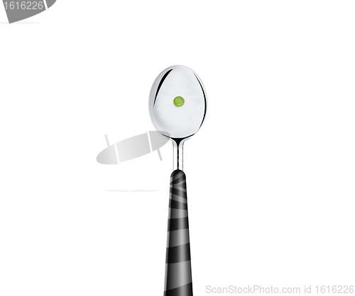 Image of spoon with green peas