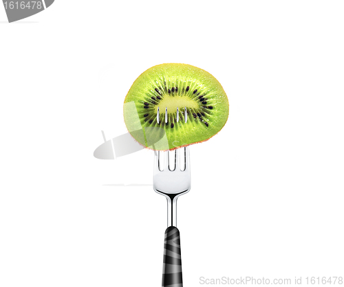 Image of kiwi slice pierced by fork,  isolated on white background 